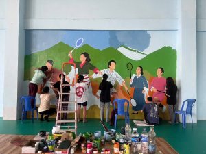 Transforming Spaces: Architecture Students Revitalize Indoor Basketball Court through Collaborative Mural Project